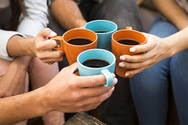 Employees share coffee and vending machine products