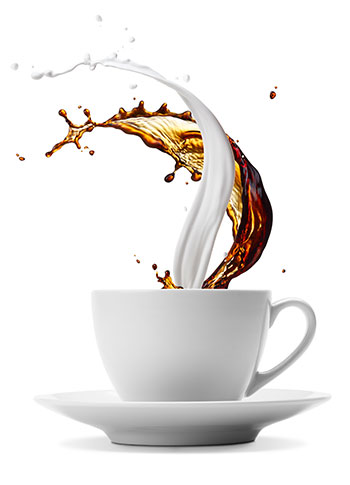 Cup of coffee with creamer and vending machines